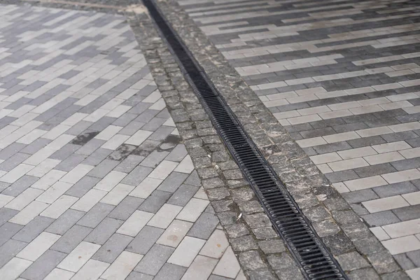 Water drain, metal part. drain in the pavement — Stock Photo, Image