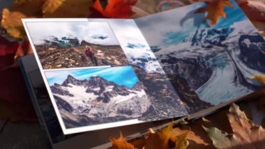 Yaprak arkaplanındaki fotoğraf, fotobook 'un yakın çekimi, aile fotoğrafı albümü