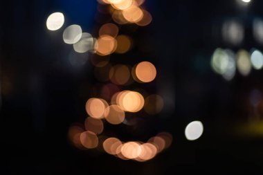 Noel arkaplanı. Bokeh ışıkları ve yıldızları olan zarif soyut arkaplan