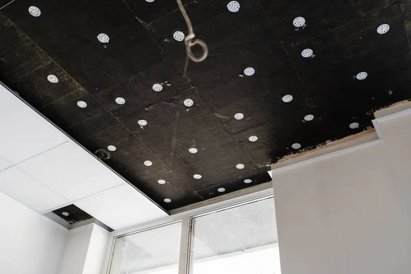 Ceiling and lighting inside office building.