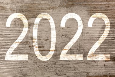 2022 yılı, klasik arka planda yazılmış.