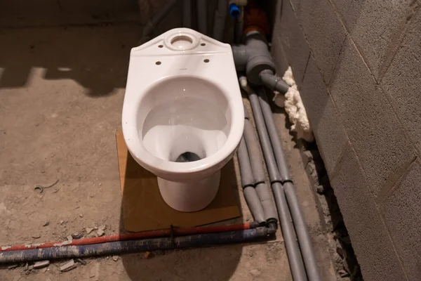 House Renovation of a Bathroom. plumbing and toilet. — Stock Photo, Image