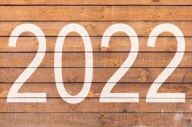 2022 yılı, klasik arka planda yazılmış.