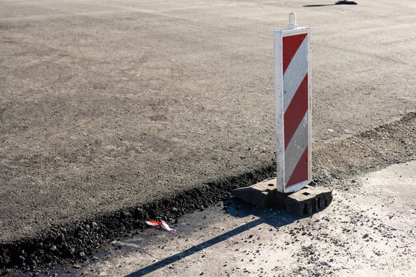 Detailní záběr asfaltu na silnici ve výstavbě. — Stock fotografie
