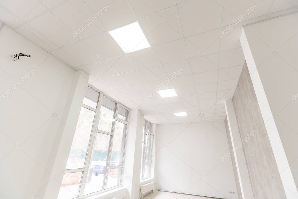 Acoustic ceiling with lighting and light channel window, Acoustic ceiling board texture Sound-proof material, Sound absorber, industry construction concept background black and white tone