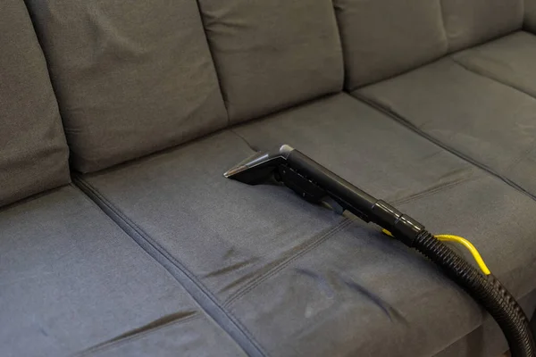 Cleaning Sofa With Vacuum Cleaner — Stock Photo, Image