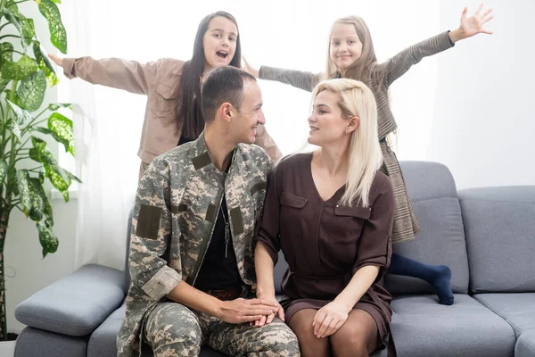 Military father with his family at home — Stock Photo, Image