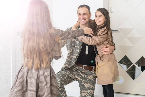 Happy military father holding daughter. family, bonding and patriotism. — Stock Photo, Image