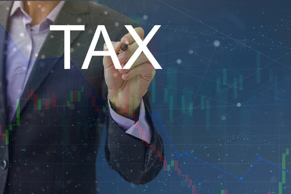 Tax with hologram businessman concept — Stock Photo, Image