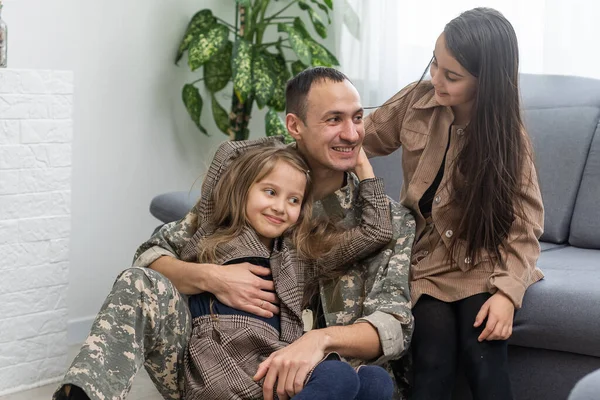 Happy military father holding daughter. family, bonding and patriotism. — Stock Photo, Image