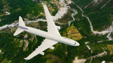 Uçağın hava görüntüsü. Uçak ormanla birlikte dağların üzerinden uçuyor. İş seyahati. Ticari uçak.