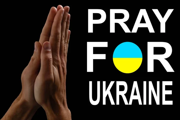 Pray for Ukraine message with a hand in prayer and the Ukrainian flag. — Stock Photo, Image