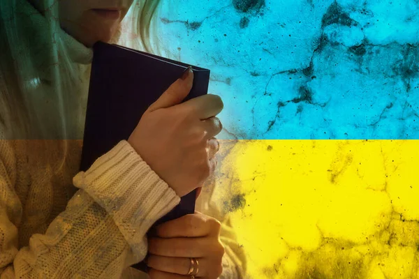 Children against war. Russias invasion of Ukraine, request for world communitys help. against background of Ukrainian flag with hands painted in yellow and blue, gesture of faith and hope — Stock Photo, Image