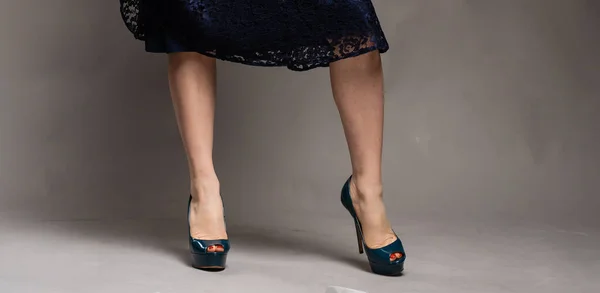 Perfect female legs wearing high heels — Stock Photo, Image