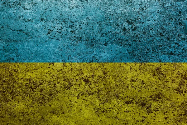 Прапор України на стіні старого каменю на задньому плані. — стокове фото