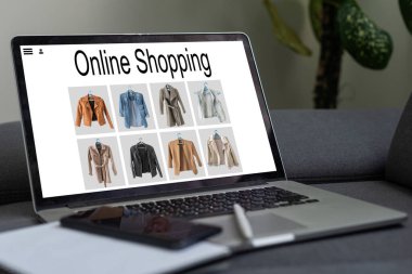 Alışveriş, teknoloji ve internet kavramı: hayali bir dükkanda dizüstü bilgisayarla alışveriş