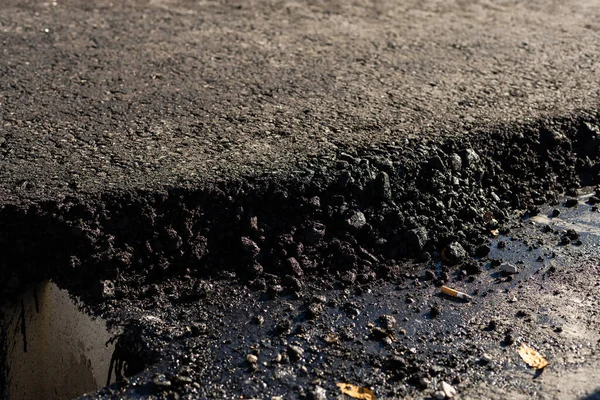 Dát asfalt na silnici — Stock fotografie