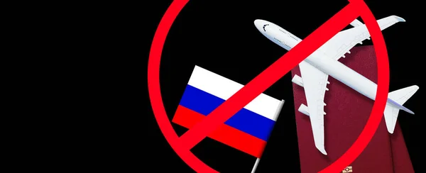 Russian flag, toy plane and barbed wire on blue background, concept of banning aircraft departing from Russia. — Stock Photo, Image
