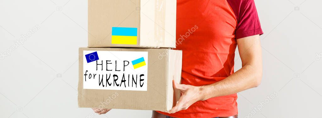 Humanitarian aid in Ukraine. Help to the poor. packages to pensioners and people with disabilities. war between Ukraine and Russia. Humanitarian aid concept. Donate for refugees.