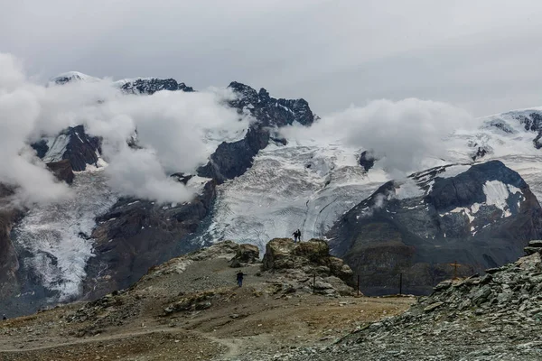 Panorama of cloud layer from mountain top over Swiss alps — Stock Photo, Image