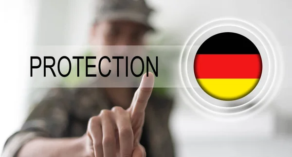 Германский флаг с кнопкой виртуальной защиты — стоковое фото