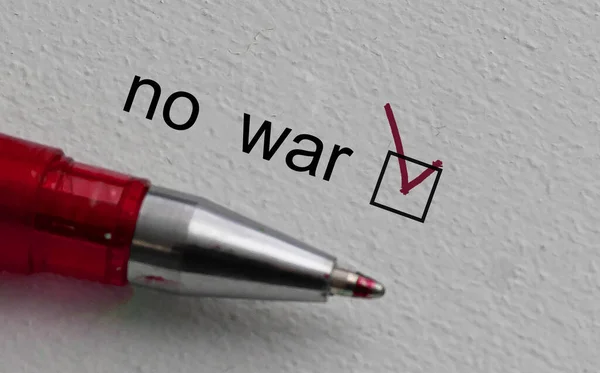 Check mark on the word no war and red pen. Closeup, concept — Stock Photo, Image