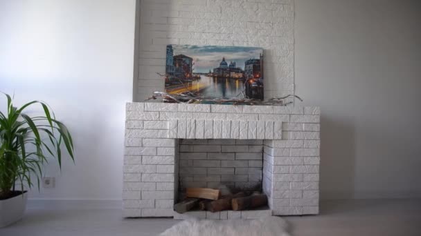 Modern artificial fireplace in the apartment. — Stock Video