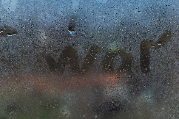 Palabra guerra en una ventana de niebla — Foto de Stock