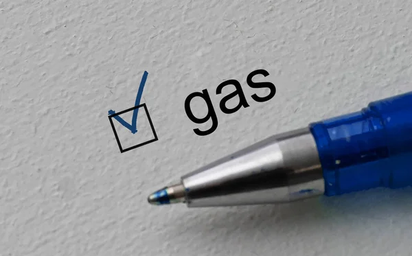 Позначте слово "газ" і "синя ручка". Крупний план, концепція — стокове фото