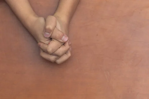 Childs hands folded together in prayer — Stock Photo, Image