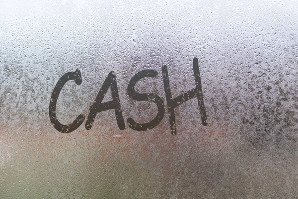 Foggy verre sur la fenêtre avec mot écrit cash — Photo