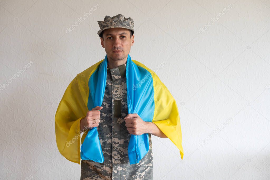 Armed Forces of Ukraine. Ukrainian soldier. Ukrainian in army. Ukrainian flag on military uniform
