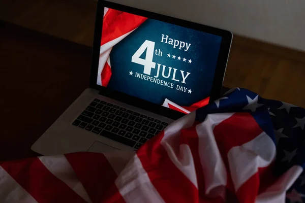 Independence Day celebration after quarantine. laptop with inscription independence day — Stock Photo, Image