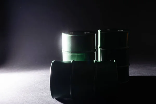 tin barrels on black background isolated close up, one round oil drum, steel keg, tin food can, canister, aluminium cask, petroleum storage packaging, fuel container, gasoline tank, canned goods