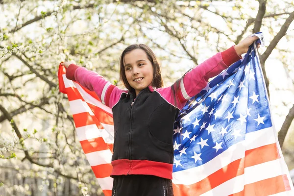 July 4th: Excited Little Girl Holding Flags — 스톡 사진
