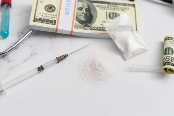 Drugs, money and syringes, isolated on White background — Stock Photo, Image