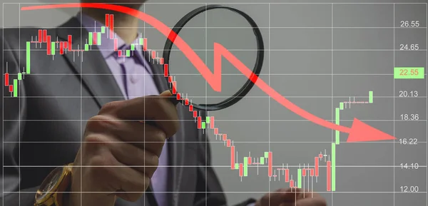 Businessman near downfall finance graph, shot on the blue background — ストック写真
