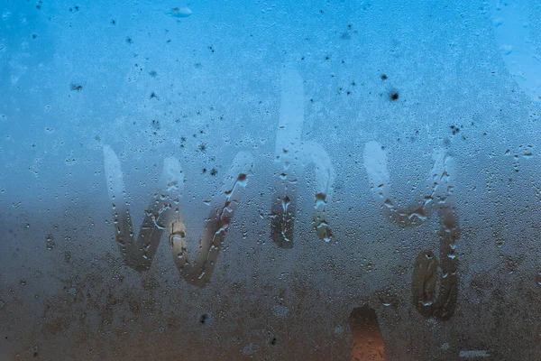 Palabra de inscripción por qué en una ventana de niebla. — Foto de Stock