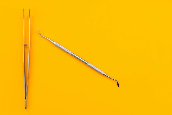 Pile of dentist tools lying ready to be used close-up — Fotografia de Stock