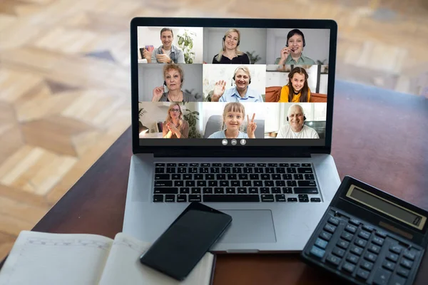 Laptop screen webcam view different ethnicity and age people engaged in group videocall. Video conference. Modern technology, easy convenient on-line meeting concept