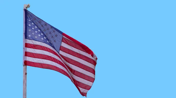 Ілюстрація американського прапора, що махає на небі — стокове фото