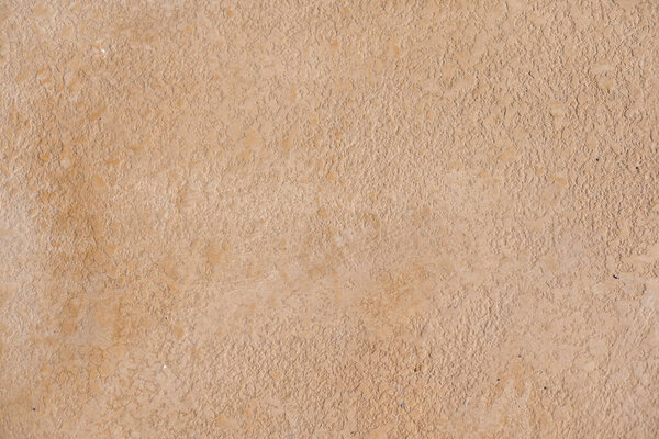 Close-up of rough limestone surface. Shell rock coquina texture. Natural background.