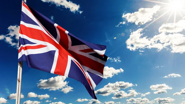 United Kingdom Union Jack Flag Waving Sky — стоковое фото