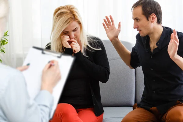 Young couple with a problem to consult a psychologist closeup, therapy.