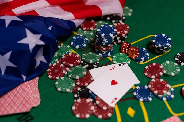 poker chips, usa flag on blackjack table.