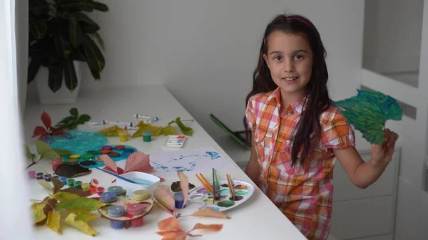 Close Little Girl Sitting Table Drawing Leaves Brush Watercolours Little — Stock Photo, Image