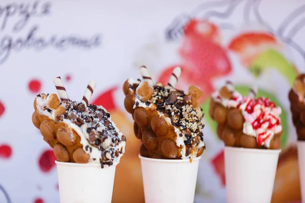 bubble waffle ice cream in paper cups.