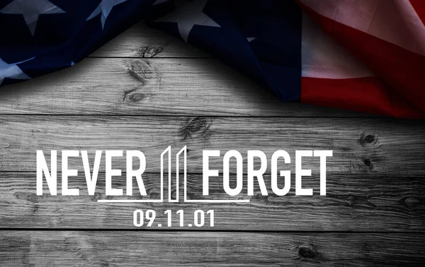 Text Never Forget 9.11 with United States flag. High quality photo
