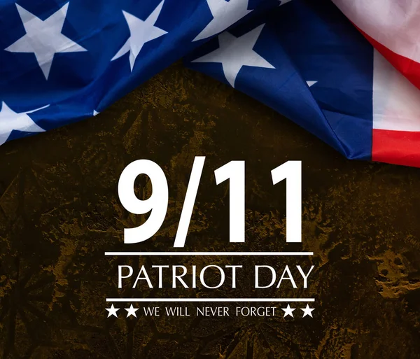 Patriot Day background with USA flag and text - Remembering September 11, 2001 - the United States flag on dark blue background stars, stripes - patriot day 9 11 illustration. High quality photo