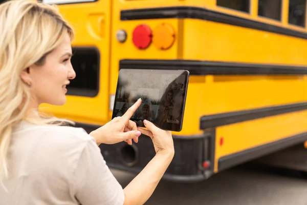 Female Teacher Student Digital Tablet School Bus Video Chat — Stock fotografie